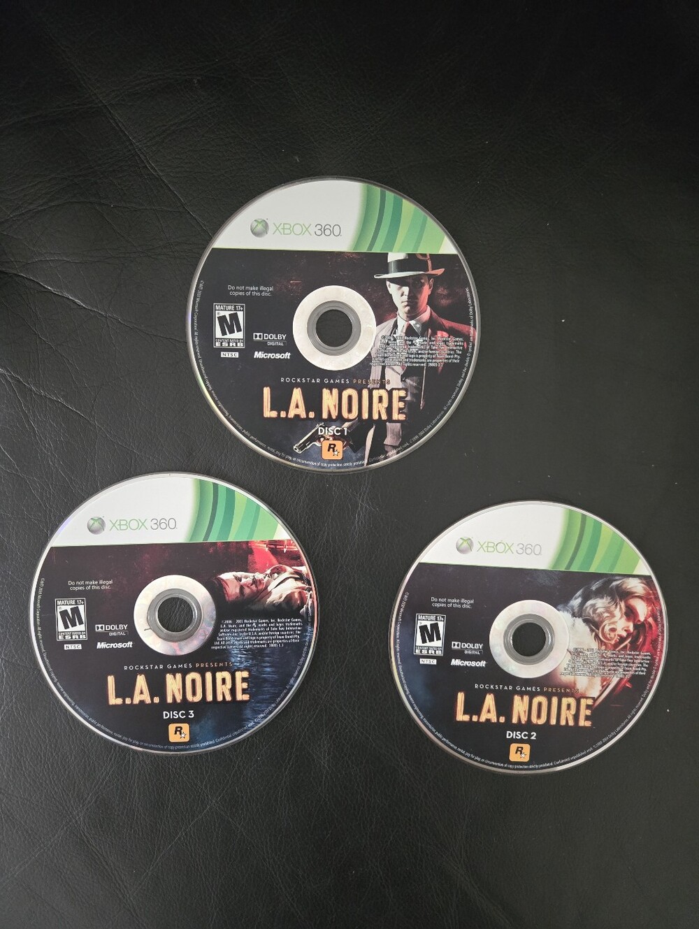 L.A. Noire( Xbox 360) NO TRACKING - 3 DISCS ONLY